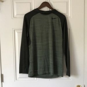 Men’s green hooded Nike dri-fit top